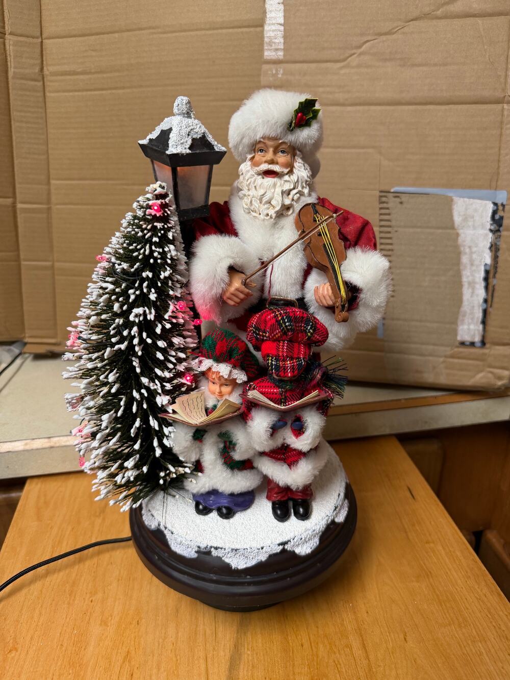 Vintage Christmas international lighted and musical santa scene 2001